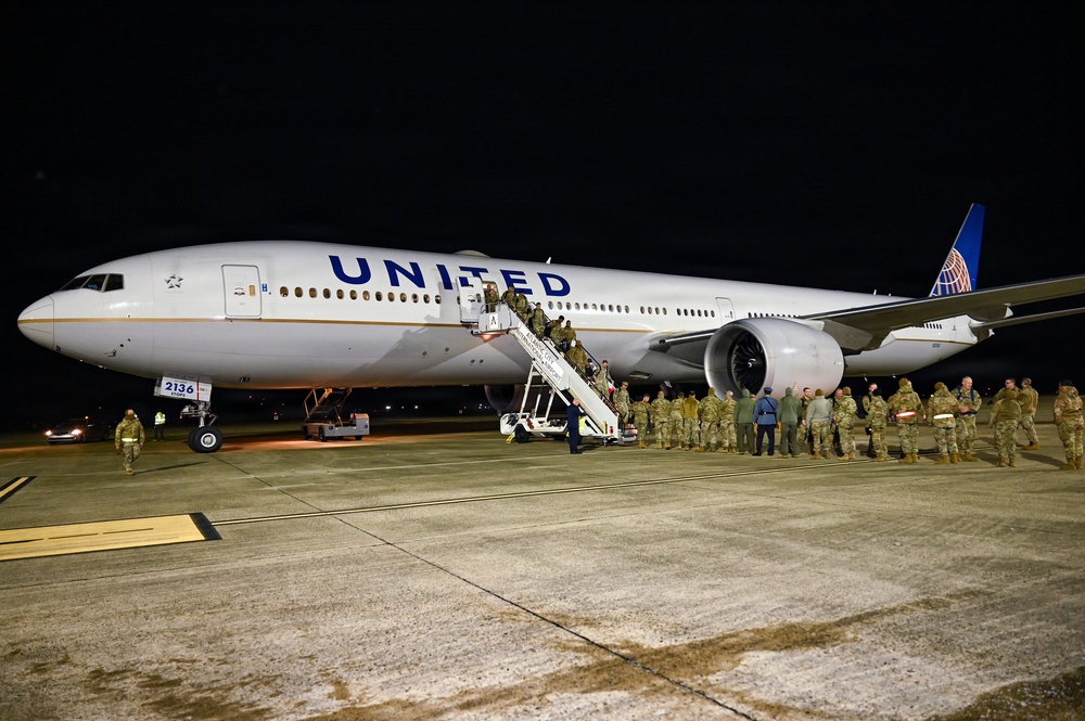 177th Fighter Wing unit members return to base after a more than three month deployment to Japan