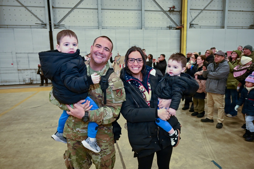 177th Fighter Wing unit members return to base after a more than three month deployment to Japan