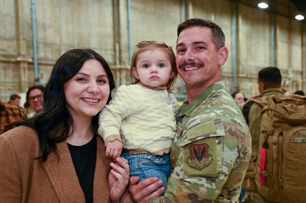 177th Fighter Wing unit members return to base after a more than three month deployment to Japan