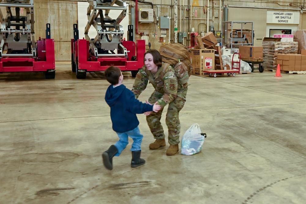 177th Fighter Wing unit members return to base after a more than three month deployment to Japan