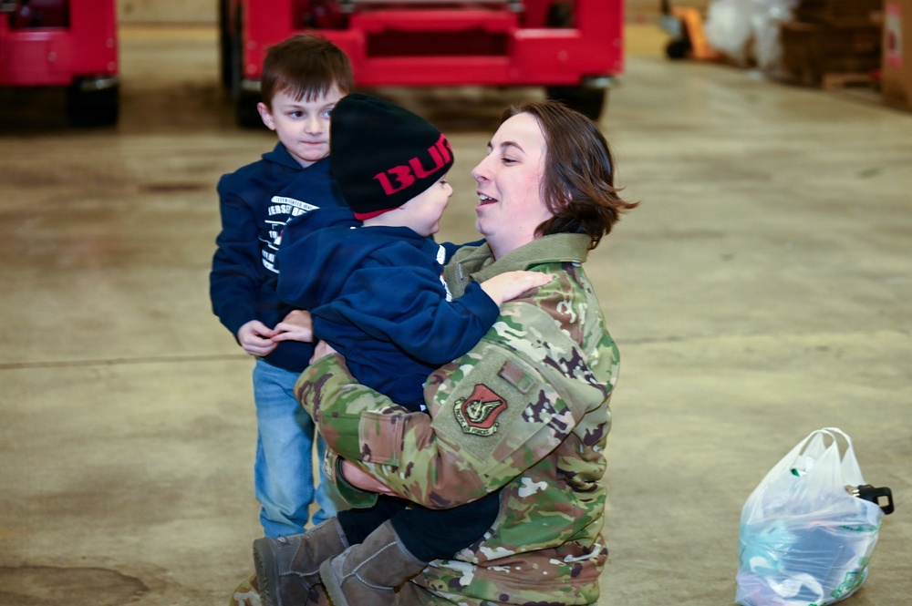177th Fighter Wing unit members return to base after a more than three month deployment to Japan