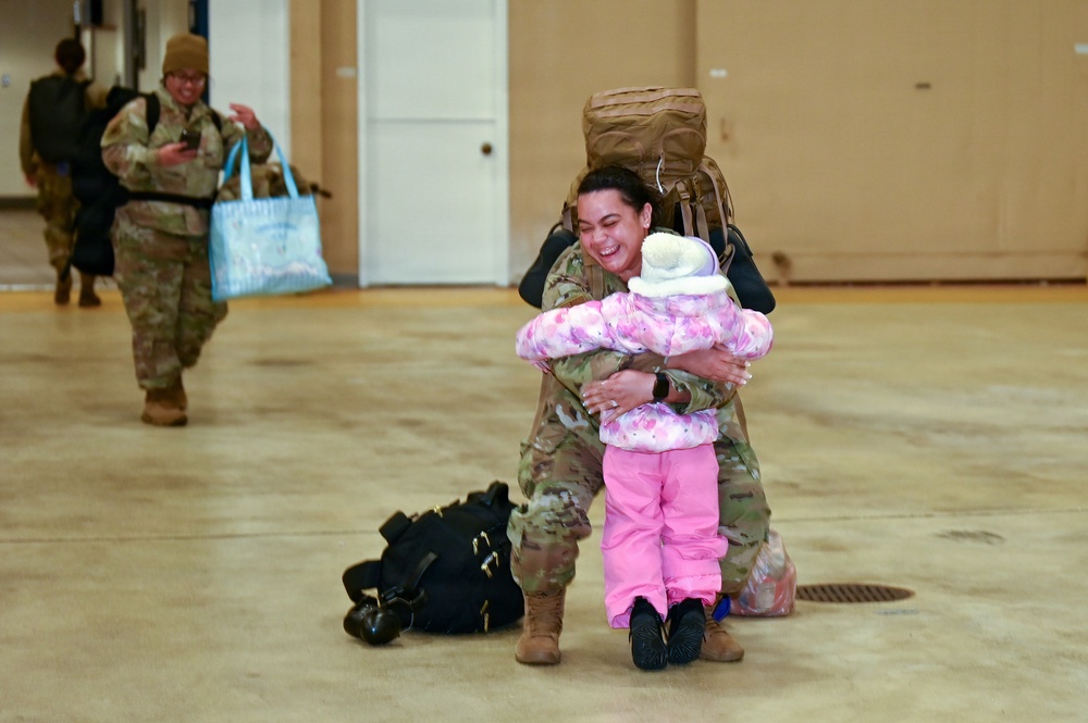 177th Fighter Wing unit members return to base after a more than three month deployment to Japan