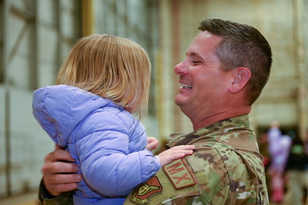 177th Fighter Wing unit members return to base after a more than three month deployment to Japan