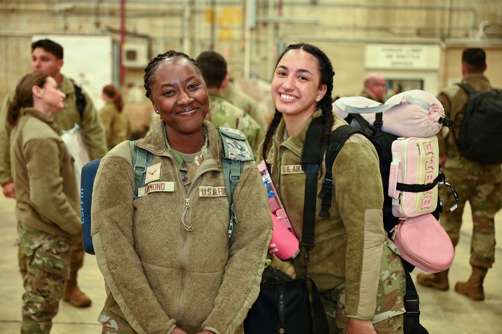 177th Fighter Wing unit members return to base after a more than three month deployment to Japan
