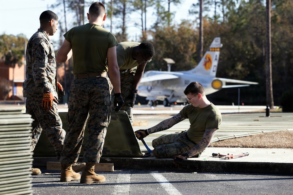 Marines Lay Expeditionary Matting for POW/MIA Memorial Aircraft Move