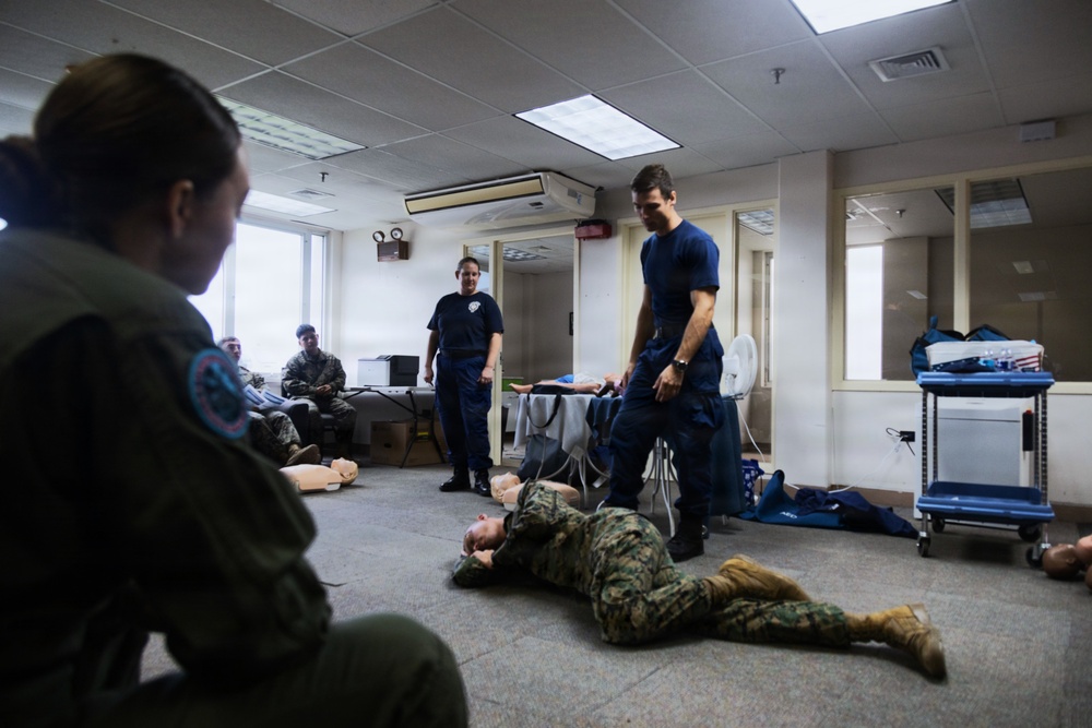 USCG Health Service Technicians provide first aid training to VMFA-225 Marines