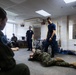 USCG Health Service Technicians provide first aid training to VMFA-225 Marines