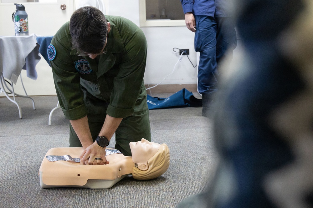 USCG Health Service Technicians provide first aid training to VMFA-225 Marines