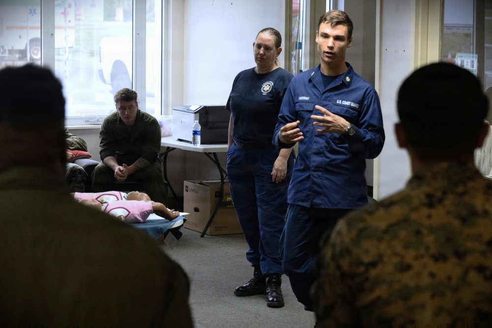 USCG Health Service Technicians provide first aid training to VMFA-225 Marines