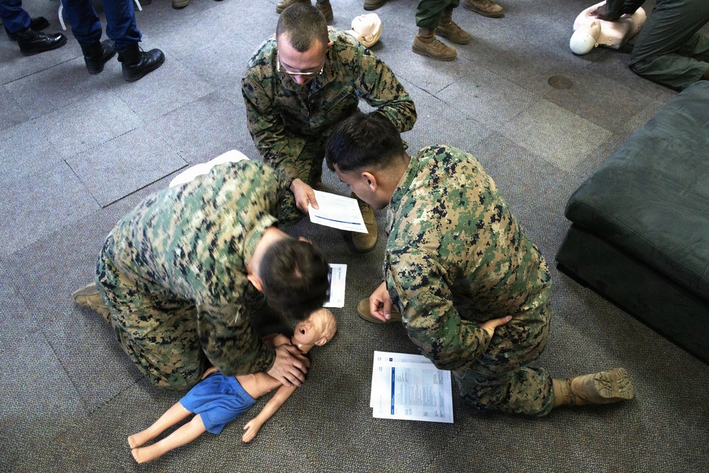 USCG Health Service Technicians provide first aid training to VMFA-225 Marines