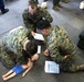 USCG Health Service Technicians provide first aid training to VMFA-225 Marines