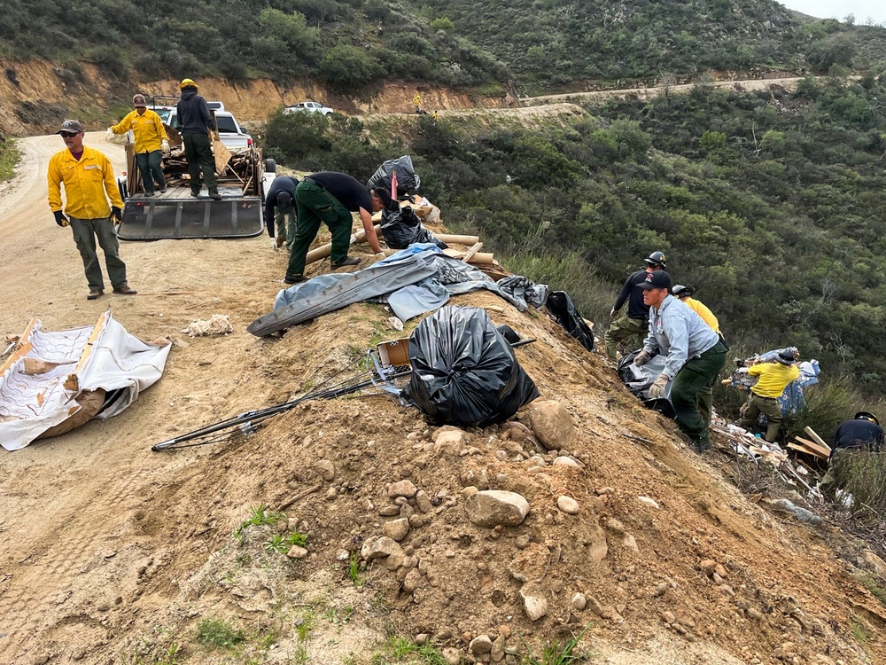 Forest Service personnel lead cleanup along Black Canyon Road