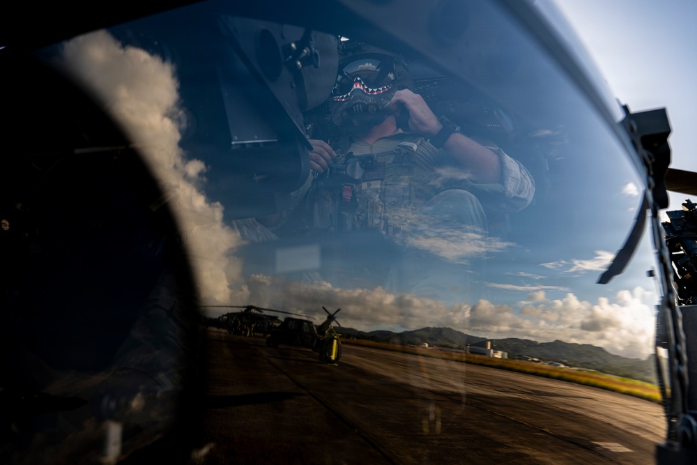 HH-60W Jolly Green IIs fly over Puerto Rico