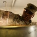 Culinary Specialists conduct feeding operations for dog faced Soldiers