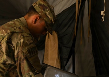 Culinary Specialist conduct feeding operations for dog faced Soldiers