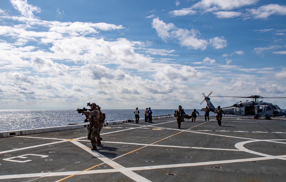 U.S. Marines Board the USS Sand Diego (LPD 22)