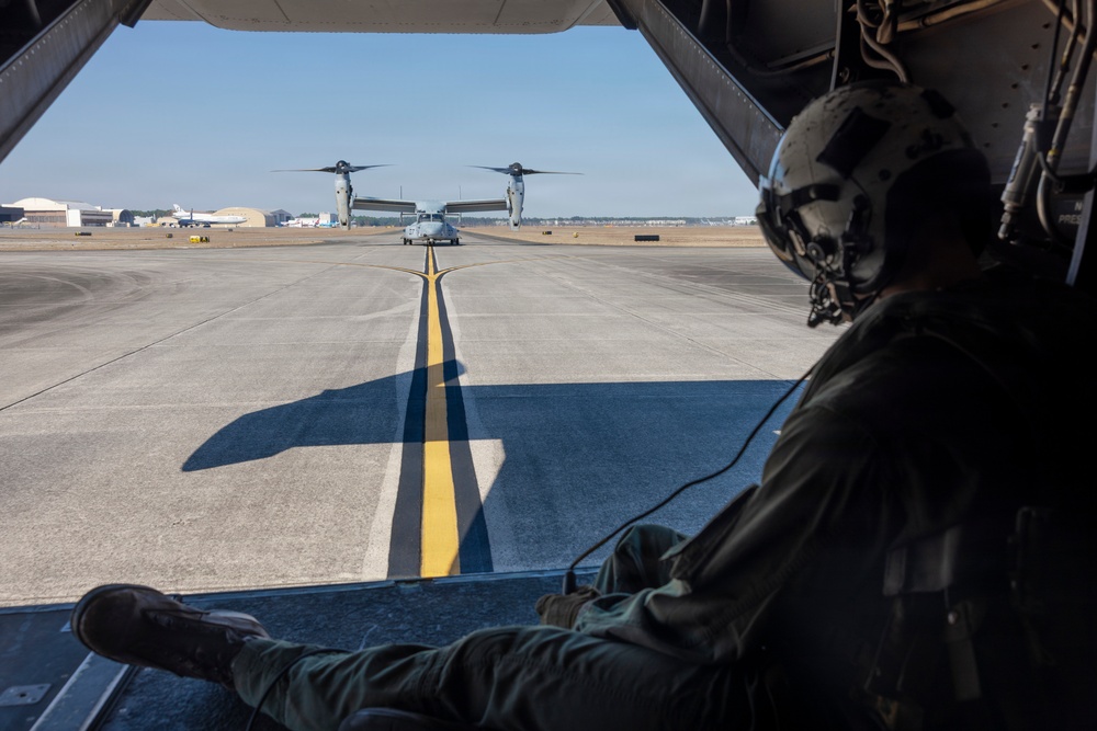 U.S. Marines with VMM-261 transport cargo