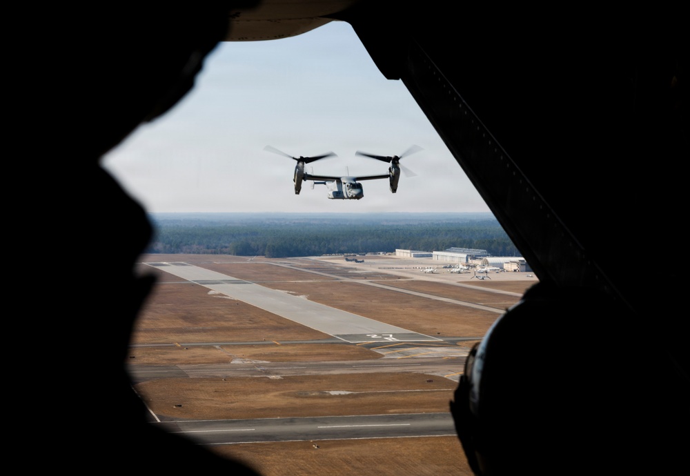 U.S. Marines with VMM-261 transport cargo