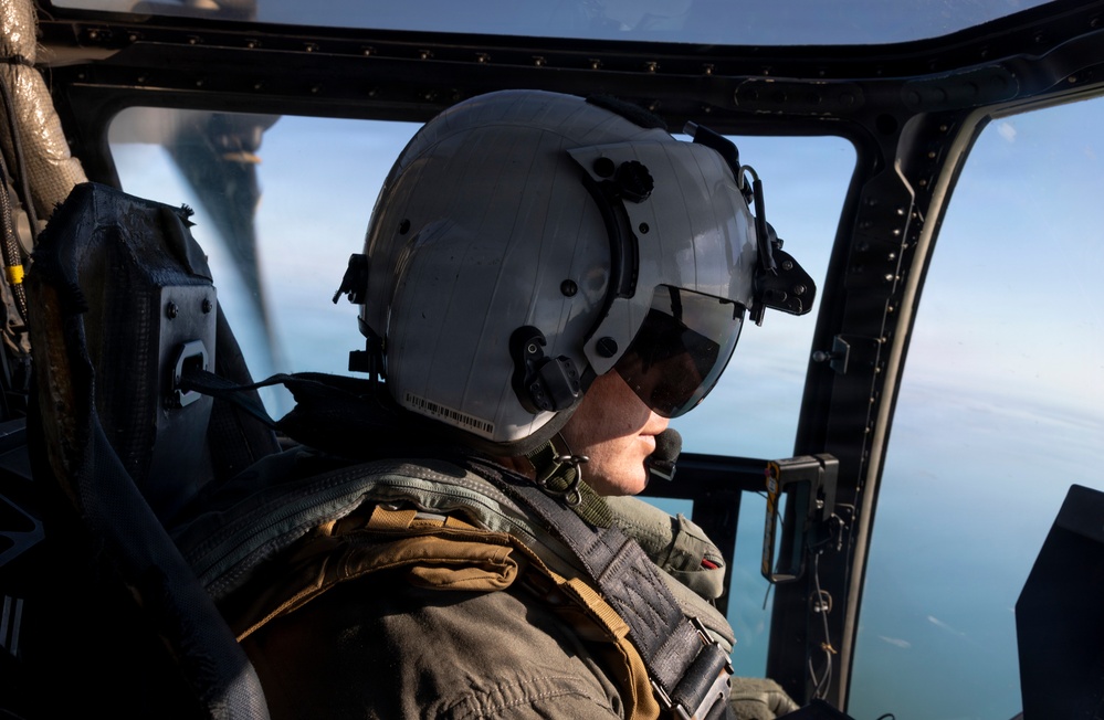 U.S. Marines with VMM-261 transport cargo