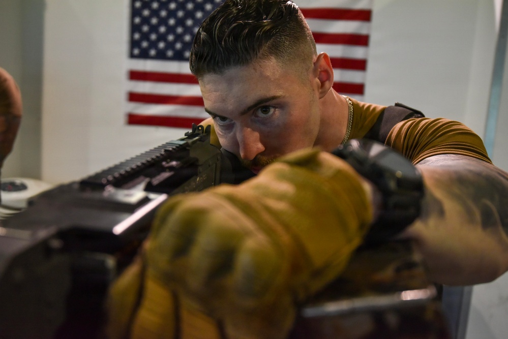 NSF Bahrain Sailors Train on Gun Range Simulator