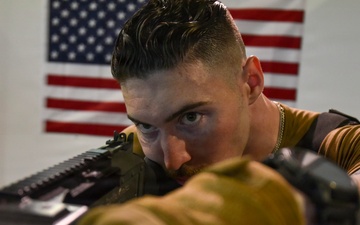 NSF Bahrain Sailors Train on Gun Range Simulator