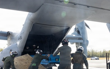 U.S. Marines with VMM-261 transport cargo to The Bahamas