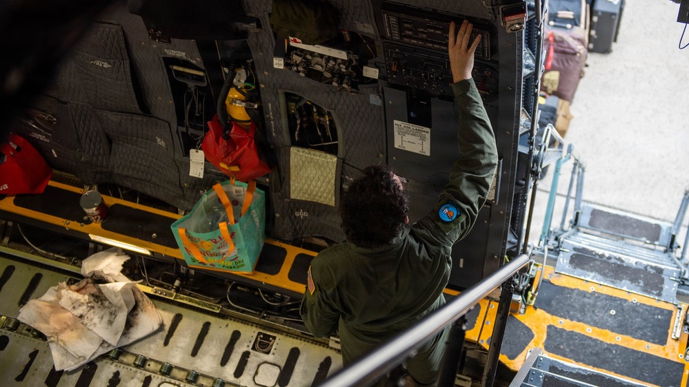 Pelican Pride: A1C Callahan Loads the C-5M