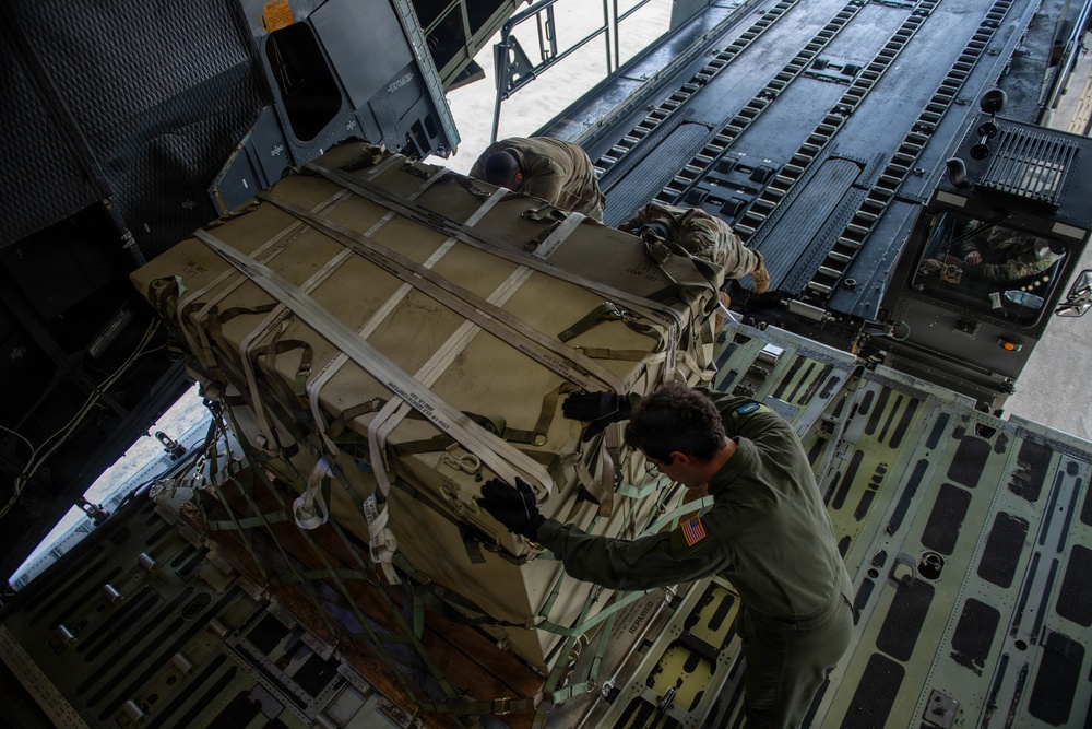 Pelican Pride: A1C Callahan Loads the C-5M