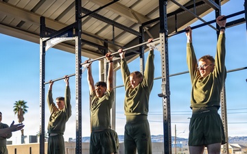 U.S. Marines participate in Col. Posey’s pull-up program