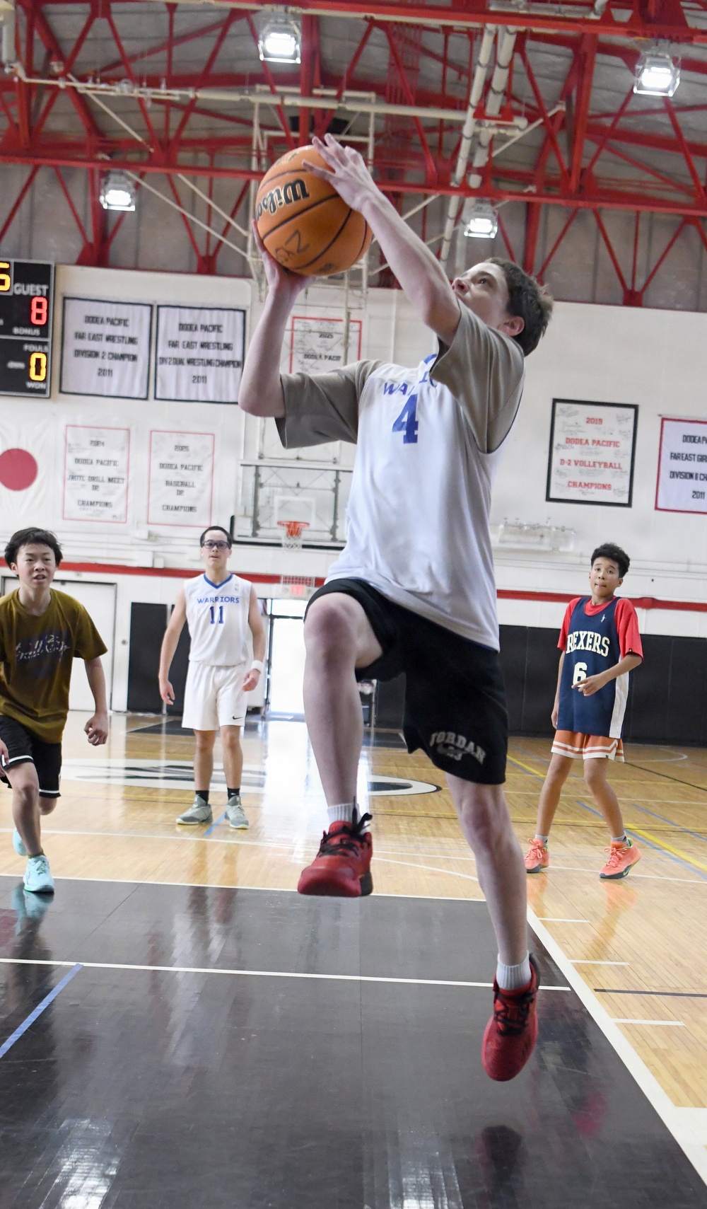 Bilateral youth basketball exchange at Camp Zama continues with day of scrimmages