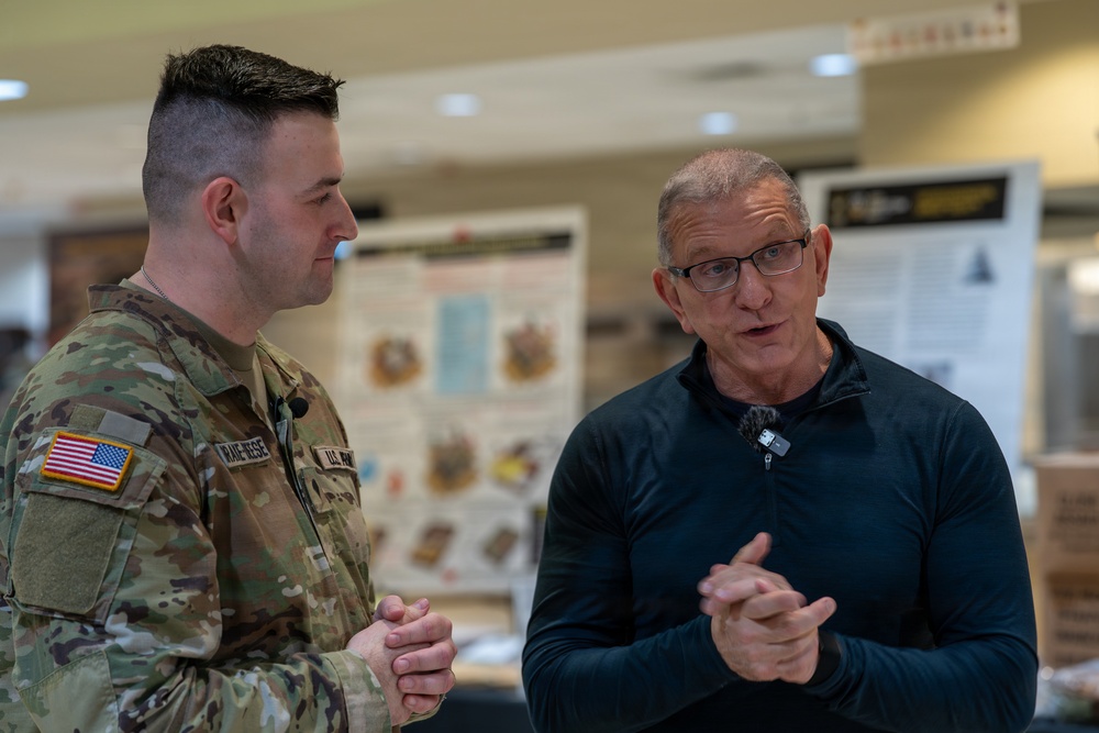 Chef Robert Irvine Reviews Dishes Prepared by 92G Soldiers