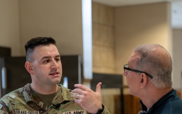 Chef Robert Irvine Reviews Dishes Prepared by 92G Soldiers