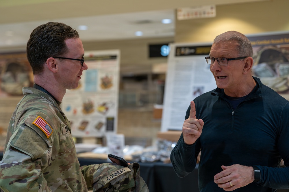 Chef Robert Irvine Reviews Dishes Prepared by 92G Soldiers