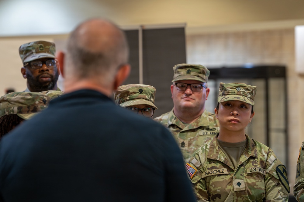 Chef Robert Irvine Reviews Dishes Prepared by 92G Soldiers