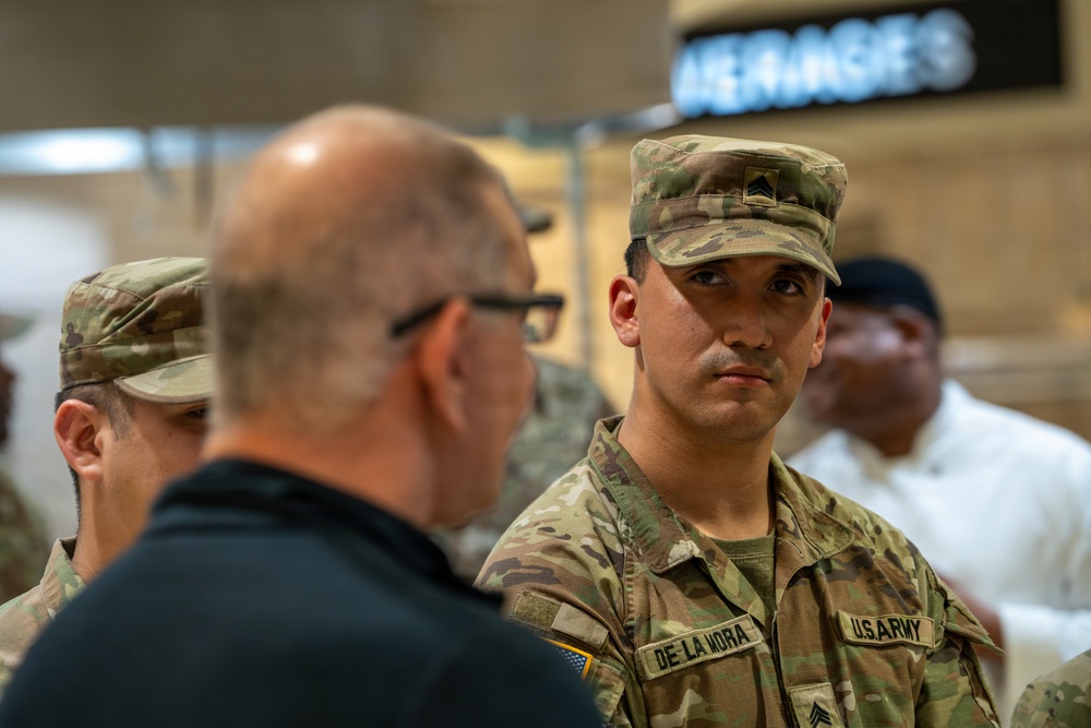 Chef Robert Irvine Reviews Dishes Prepared by 92G Soldiers