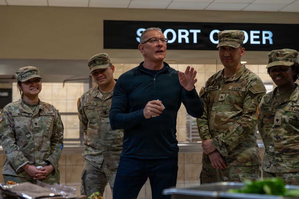 Chef Robert Irvine Reviews Dishes Prepared by 92G Soldiers