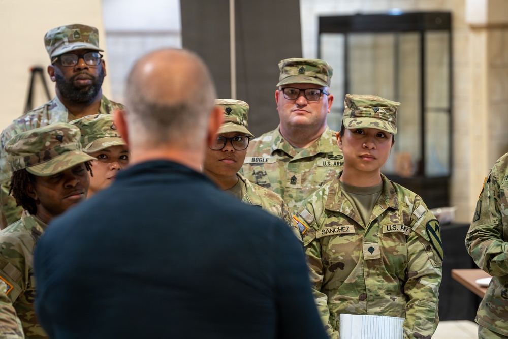 Chef Robert Irvine Reviews Dishes Prepared by 92G Soldiers