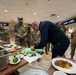 Chef Robert Irvine Reviews Dishes Prepared by 92G Soldiers