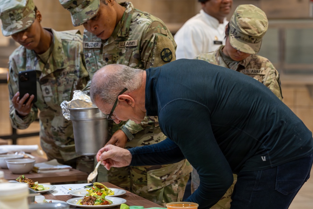 Chef Robert Irvine Reviews Dishes Prepared by 92G Soldiers