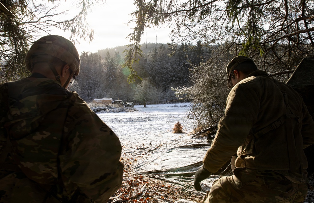 U.S. Army Sgt. Joseph Peake, Left, And Sgt. Trevor Seiler, Document The Training Area During Combined Resolve 26-05