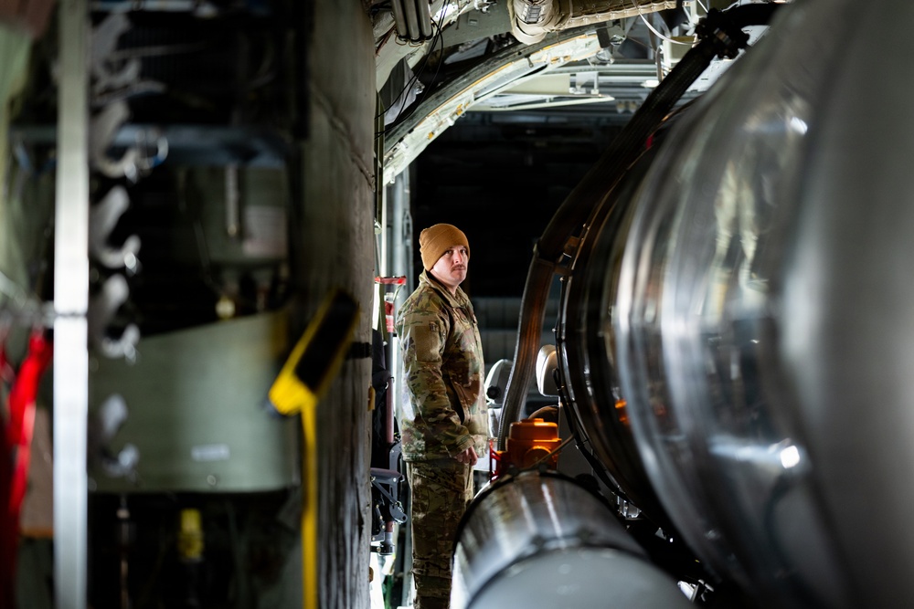 153rd Airlift Wing Airman inspected MAFFS equipment before departure