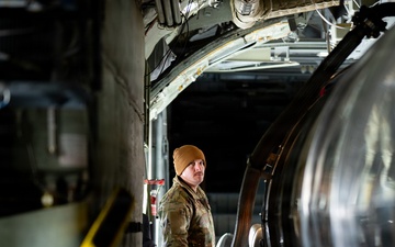 153rd Airlift Wing Airman inspected MAFFS equipment before departure