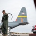 153rd Airlift Wing Airman Carries Air Hose for MAFFS Test