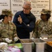 Chef Robert Irvine Reviews Dishes Prepared by 92G Soldiers