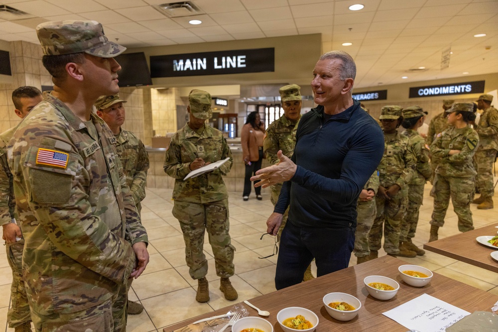 Chef Robert Irvine Reviews Dishes Prepared by 92G Soldiers