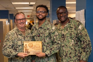 AFN Naples Radio News - Adm. Daryl Caudle's First Notes and the Junior Officer Symposium
