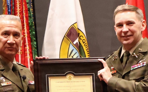 LTG Lozano presents certificate to COL Guy Yelverton III