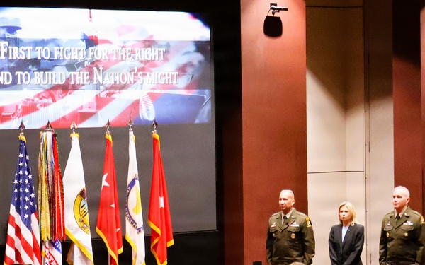 Ceremony overview with audience and leadership on stage