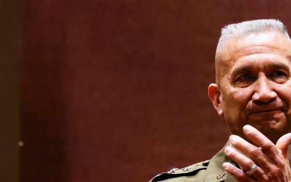 LTG Lozano applauds during ceremony