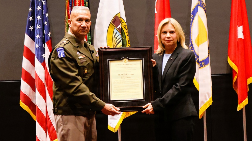 LTG Lozano presents certificate to Ms. Miranda H. Oden